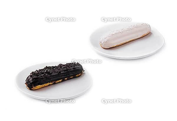 Food, Two delicious eclairs covered with glaze [IBR123622462]