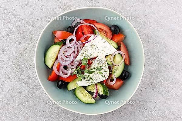 Food, Salad with cheese and fresh vegetables isolated on white background. Greek salad [IBR123622463]