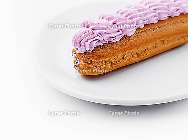Food, Fresh tasty eclairs isoalted on white background [IBR123622478]