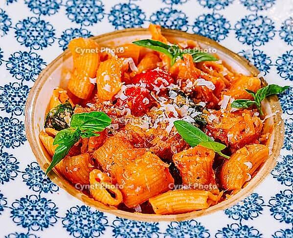 Food, Penne pasta with tomato sauce close up [IBR123622489]