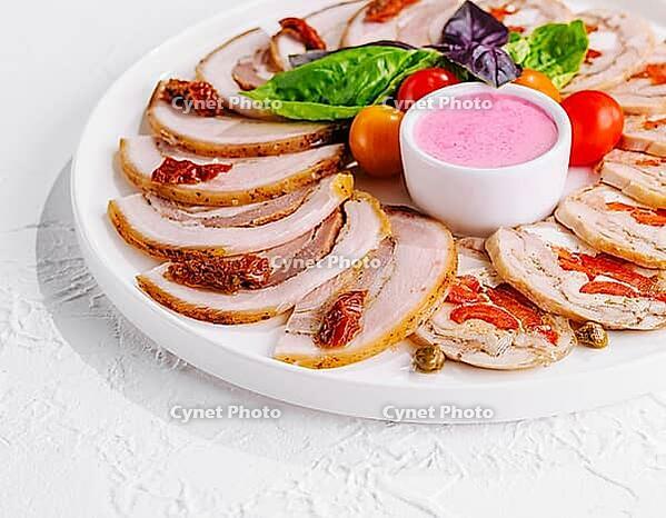 Food, Sliced meatloaf with peppers and capers [IBR123622498]