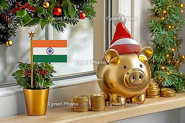 Flag of India on a potted holly plant and golden piggy bank with hat and coins, sorrounded by festive decorations during Christmas holiday season.Business, finance and economy concept, AI generated [IBR123622510]