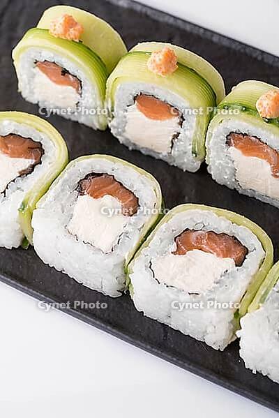 Food, Close-up of sushi rolls made of sausage and covered with cabbage and ketchup. Homemade asian style. Sushi-food hybrids trend. Japanese food [IBR123638347]