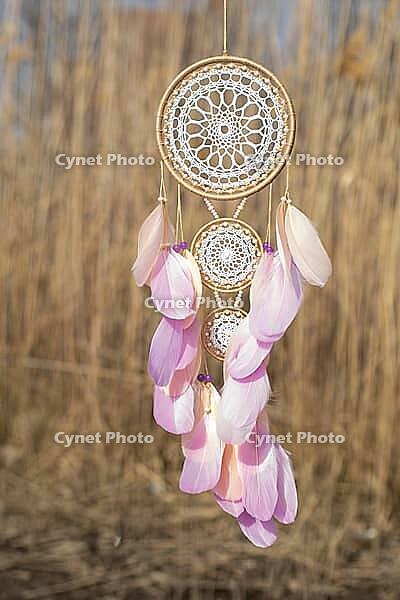 Dream catcher with feathers threads and beads rope hanging. Dreamcatcher handmade [IBR123639531]