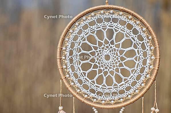 Dream catcher with feathers threads and beads rope hanging. Dreamcatcher handmade [IBR123639532]