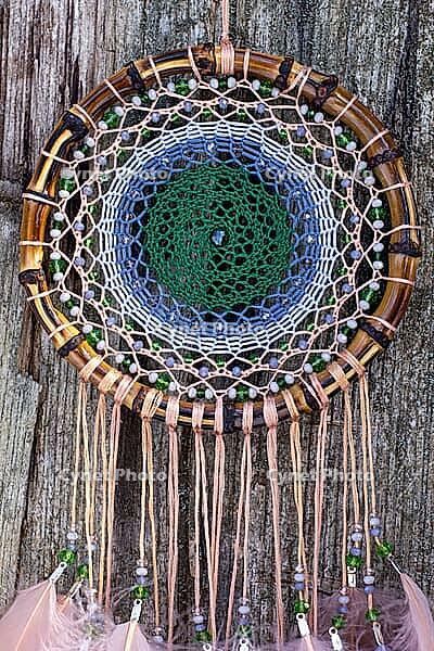 Dream catcher with feathers threads and beads rope hanging. Dreamcatcher handmade [IBR123639539]