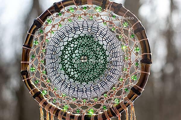 Dream catcher with feathers threads and beads rope hanging. Dreamcatcher handmade [IBR123639541]