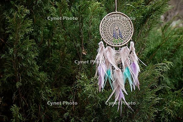 Dream catcher with feathers threads and beads rope hanging. Dreamcatcher handmade [IBR123639545]