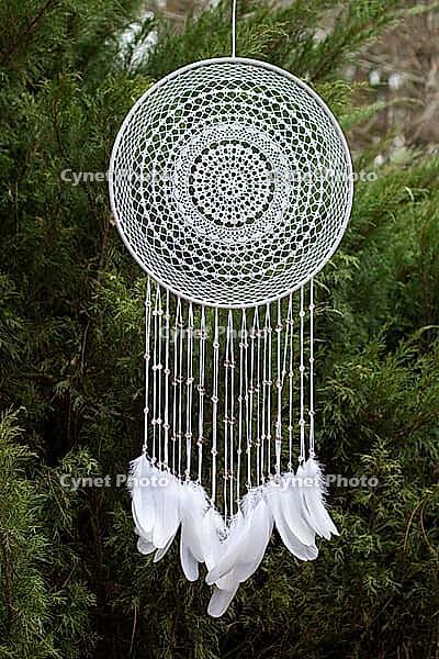 Dream catcher with feathers threads and beads rope hanging. Dreamcatcher handmade [IBR123639546]