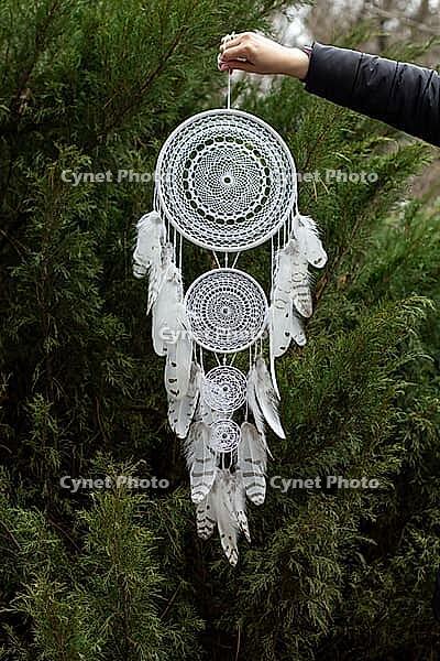 Dream catcher with feathers threads and beads rope hanging. Dreamcatcher handmade [IBR123639548]