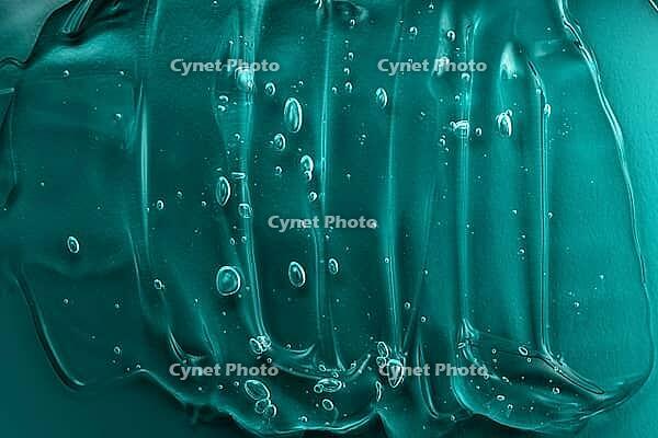 Facial skincare cleanser smudge. Abstract cosmetic texture background. Tidewater green trendy texture. Moisturizer with vitamin and aloe vera. Gel smear with bubble. Transparent beauty product. Macro [IBR123646469]