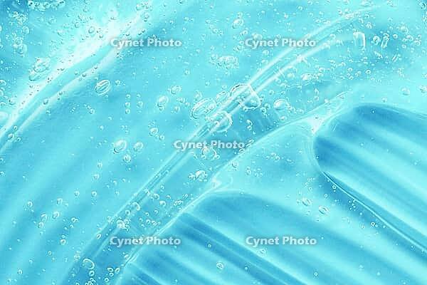 Blue gel sanitizer swatch. Antibacterial hygiene sanitiser splash. Skincare hydration product with aloe and collagen. Cleanser texture. Liquid clear jelly smear. Serum, shampoo or shaving cream smudge [IBR123646473]