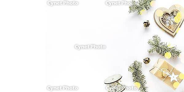 Christmas composition on white surface. Handmade gift box, holiday decorations, fir branches. Christmas DIY present concept. Flat lay, top view, copy space, banner [IBR123646482]