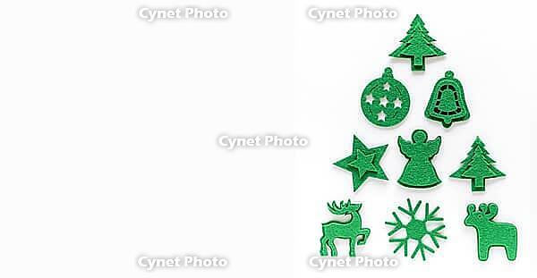 Creative christmas tree layout made from felt decorations. Flat lay, top view, copy space. Holiday festive minimal concept [IBR123646485]