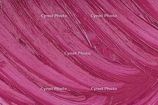 Marsala beauty product sample closeup. Purple cosmetics smear pattern background. Liquid lipstick cosmetic. Pink swatch matt backdrop. Makeup creamy texture. Creamy stroke [IBR123646518]