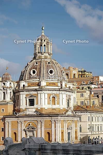 Rome, Italy - 09.12.2022: Chiesa di Santa Maria di Loreto. Historic architecture of Rome: majestic dome and traditional buildings against blue sky [IBR123646524]