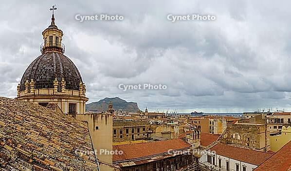 Palermo, Italy - 06.11.2022: Chiesa di Santa Caterina d'Alessandria, Chiesa Santa Chiara. Historic cityscape with rooftops and cathedral dome under cloudy skies [IBR123646535]