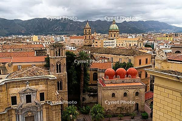 Palermo, Italy - 06.11.2022: Scenic view of historic Palermo architecture with mountains in the background [IBR123646539]
