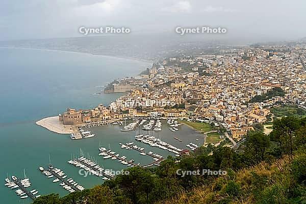 Castellammare del Golfo, Italy - 05.11.2022: Scenic coastal town with harbor and mediterranean sea view, Castello Arabo Normanno aerial view [IBR123646552]