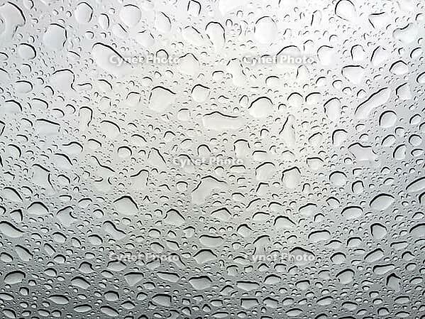 Abstract texture of water drops on a glass [IBR123646558]