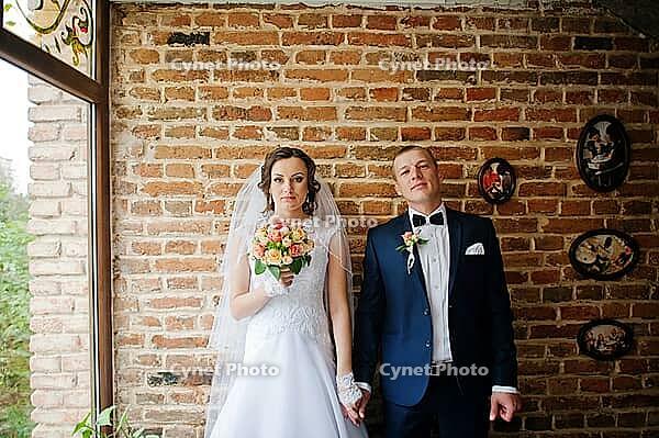 Wedding couple at vintage cafe at autumn day [IBR123675074]