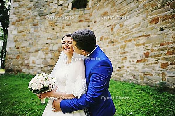 Young wedding couple in love on their wedding day [IBR123675088]
