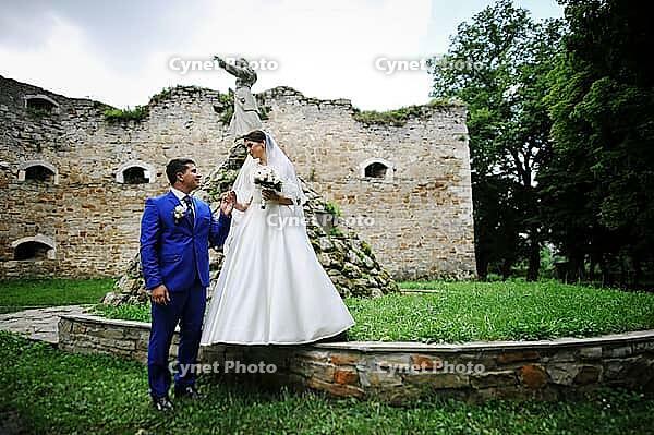 Young wedding couple in love on their wedding day [IBR123675090]