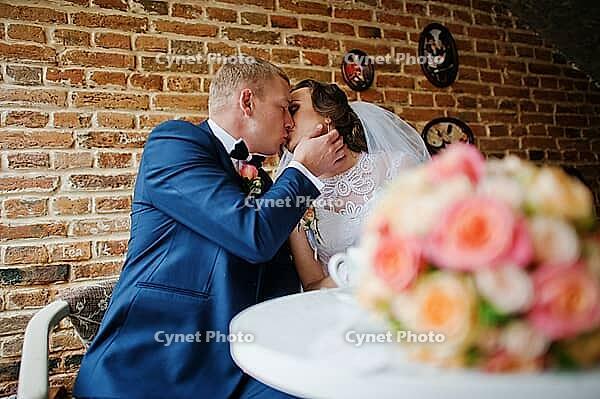 Wedding couple at vintage cafe at autumn day [IBR123675097]