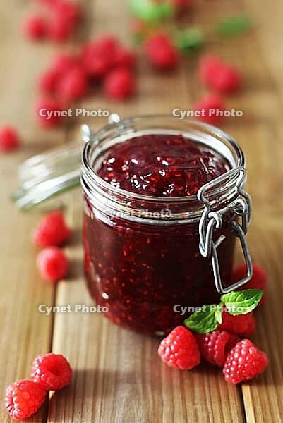 A Jar Of Raspberry Jam On Wooden Background [IBR123700036]
