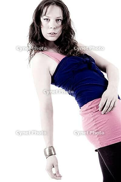 Young woman posing with a fashion attitude [IBR123700070]