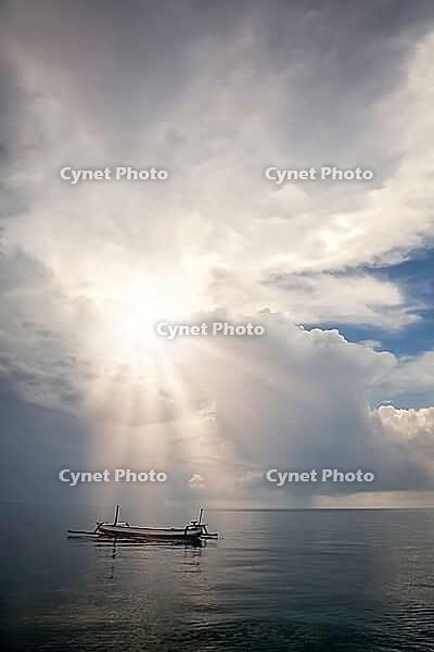 Small fisherman boat on the calm sea on the northern coast of Bali Island, Indonesia, Asia [IBR123713298]