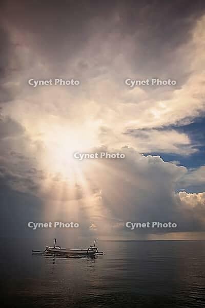 Small fisherman boat on the calm sea on the northern coast of Bali Island, Indonesia, Asia [IBR123713301]