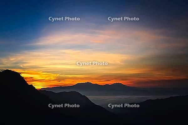 Early morning after sunrise view of the spectacular Gunung Bromo and Sumeru volcanoes in Java, Indonesia [IBR123713306]