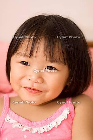 Portrait of a little Asian girl [IBR123713356]