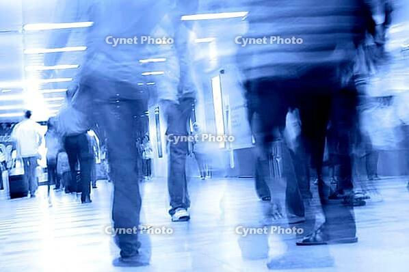 Motion blurred of people walking in subway [IBR123713362]