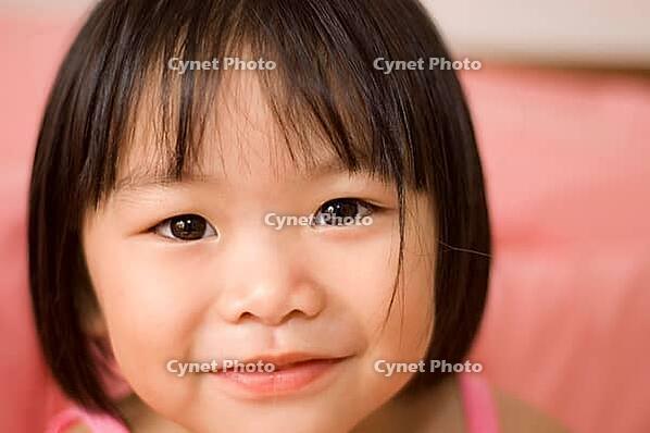 Little asian girl with smiling face [IBR123713369]