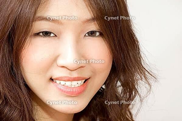 Portrait of a smiling Asian [IBR123713392]