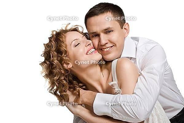 Portrait of a beautiful young happy smiling couple - isolated [IBR123723178]