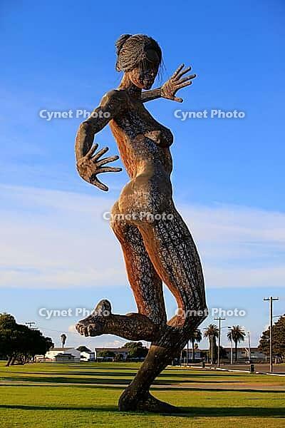 SAN FRANCISCO-OCT 24: 40-foot mesh sculpture of a woman called Bliss Dance by artist Marco Cochrane on Treasure Island in San Francisco on Oct. 24, 2012. Night viewers can alter lights with a phone app [IBR123723235]