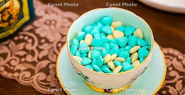 Small sugary jelly bean candy as topping on ice cream or other pudding dessert [IBR123723293]