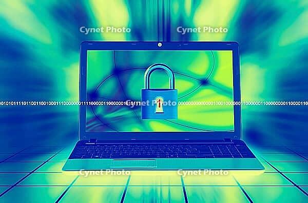 A laptop screen displays a padlock with binary code, symbolizing digital security and cybersecurity themes [IBR123760802]