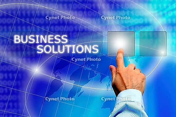 Man hand making a choice among various buttons - business solutions concept [IBR123760808]