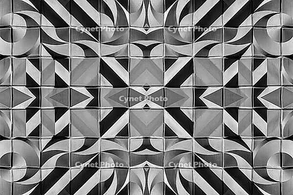 Abstract photography with symmetrical, abstract patterns that consist of sharp geometric and wavy shapes in shades of black, white and gray [IBR123760816]