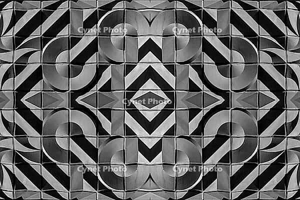 Abstract photography with symmetrical, abstract patterns that consist of sharp geometric and wavy shapes in shades of black, white and gray [IBR123760829]