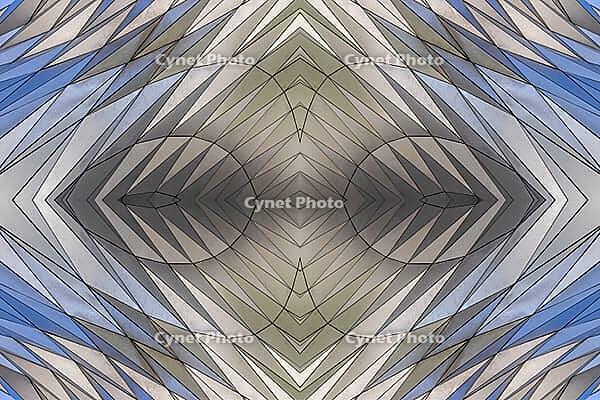 Abstract photography with a symmetrical, diamond-shaped shape that consists of repetitive lines and surfaces in shades of gray, white and blue and creates an impression of rhythm, depth and cool geometric harmony [IBR123760837]