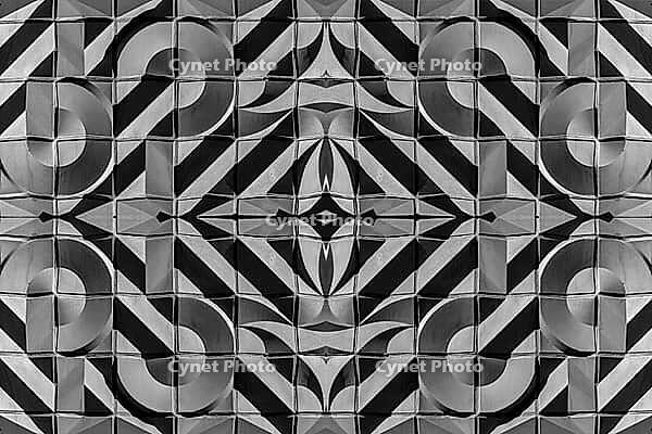 Abstract photography with symmetrical, abstract patterns that consist of sharp geometric and wavy shapes in shades of black, white and gray [IBR123760846]
