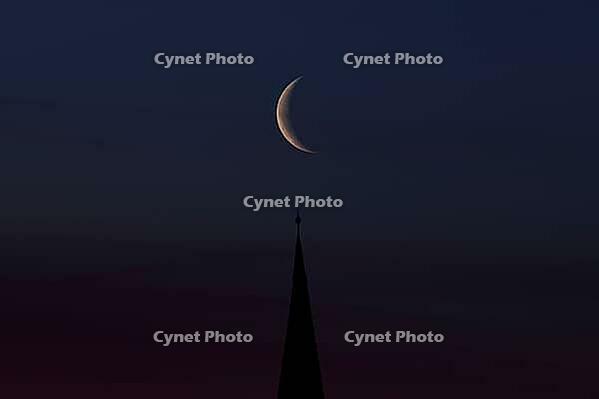 Crescent moon with waning moon over the spire of the pilgrimage church of St. Aegidius in Schildthurn, dawn, dawn, Lower Bavaria, Bavaria, Germany [IBR123760851]