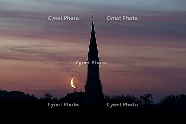 Crescent moon with waning moon next to the church tower of the pilgrimage church of St. Aegidius in Schildthurn, dawn, dawn, silhouette, Lower Bavaria, Bavaria, Germany [IBR123760854]