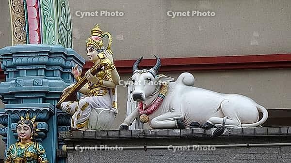 Detailed statues on a temple with traditional Indian art and colorful decoration, Singapore, Singapore [IBR123769644]