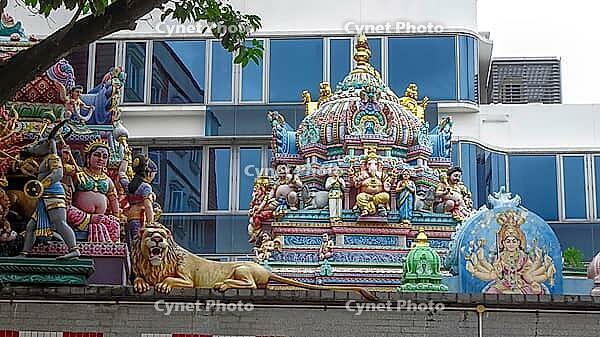 Colourful temple roof with figures and a lion, Singapore, Singapore [IBR123769646]